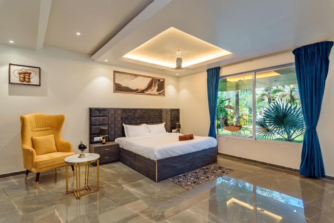 Saffronstays Palm Paradise, Kalyan Khadavli - Swimming Pool With Water Slides, Gazebo And Indoor Games Padghe Buitenkant foto