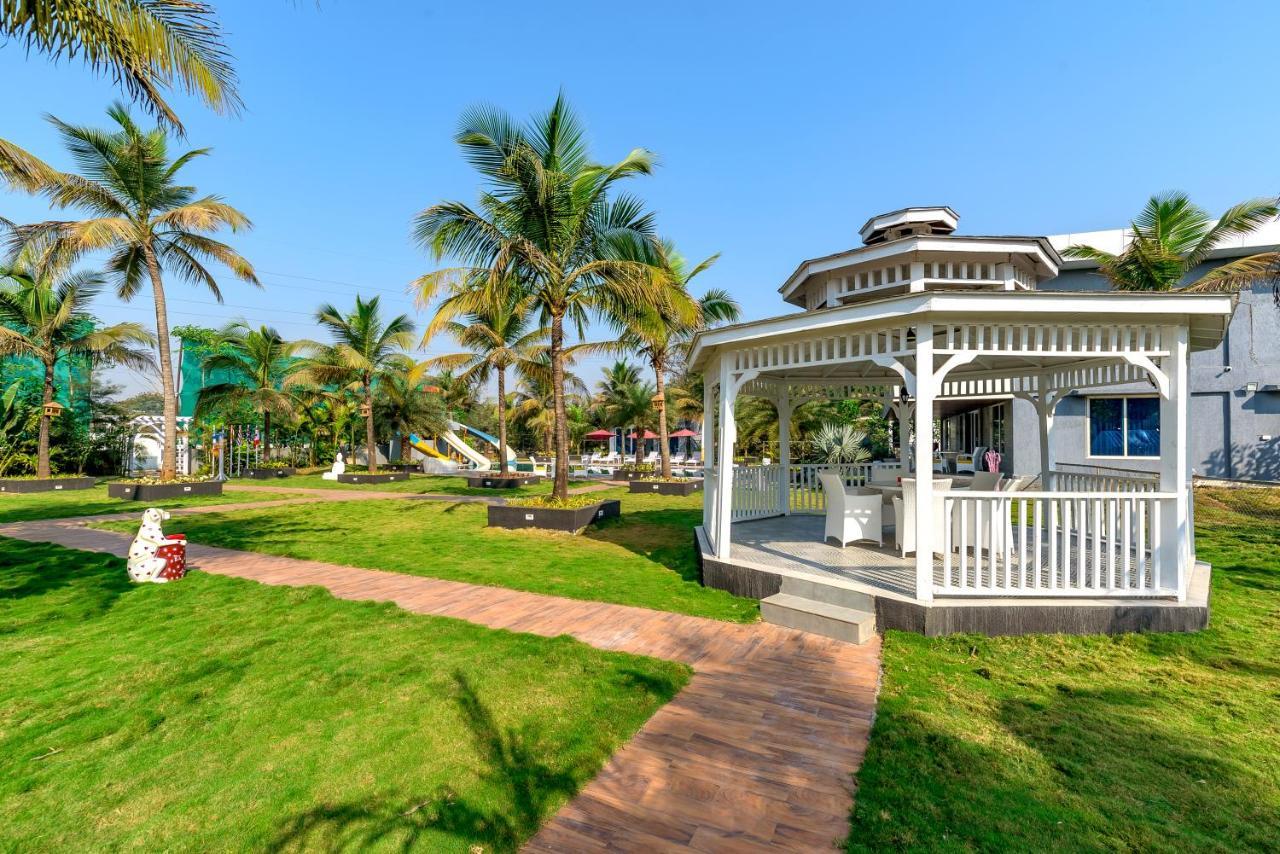 Saffronstays Palm Paradise, Kalyan Khadavli - Swimming Pool With Water Slides, Gazebo And Indoor Games Padghe Buitenkant foto