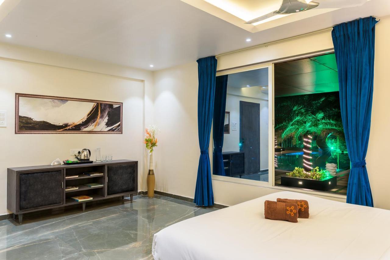Saffronstays Palm Paradise, Kalyan Khadavli - Swimming Pool With Water Slides, Gazebo And Indoor Games Padghe Buitenkant foto